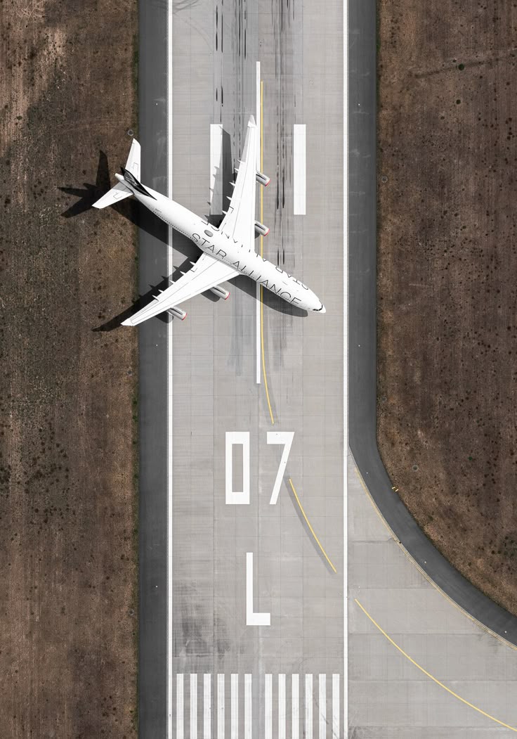 Airplane on the runway seen from above